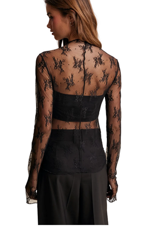 a woman wearing Sheer Lace Long-sleeve Top - Black