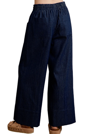 a woman wearing a Stripe Elasticized Waist Wide Pants- dark denim