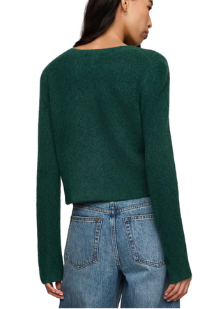 a woman wearing a Z Supply Medina Open Knit Cardigan - Velvet Green