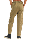 Seaside Safari Cargo Pants  Olive green washed cargo pants are a fantastic choice for a laid-back beach vacation. You can wear them for a sunset beach bonfire, casual seaside dinners, or exploring local markets and boardwalks. Their comfortable and versatile style makes them perfect for strolling along the shore, and the earthy color complements the coastal vibes beautifully.   Material:  90% Cotton, 10% Polyester back