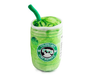Green plush toy resembling a Starbucks iced matcha drink with a straw on a white background