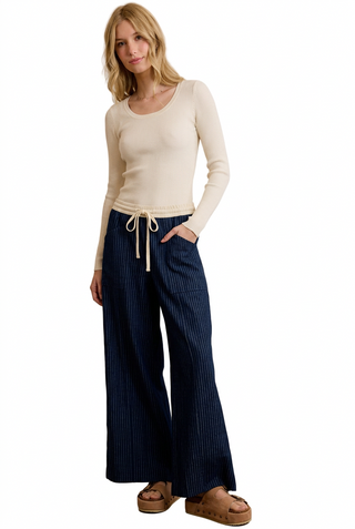 a woman wearing Stripe Elasticized Waist Wide Pants in the color dark denim