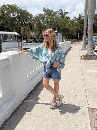 woman wearing a Tropical Kimono Duster- Turquoise