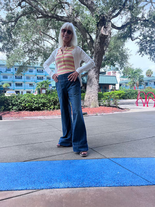 A woman wearinfg We The Free Breezy Denim Pull On Jean