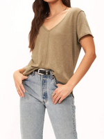 Wearever Tee in Alpine Moss  This tee is where it all began. The Wearever is our signature style and has become a staple in closets worldwide.   This always flattering tee has a relaxed fit, v-neckline and center seam detail. It is finished with raw edging throughout and a shirttail hemline.