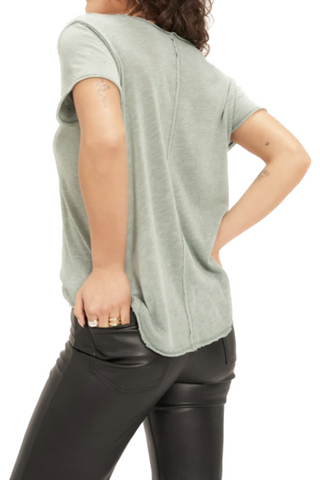 This tee is where it all began. The Wearever is our signature style and has become a staple in closets worldwide.   This always flattering tee has a relaxed fit, v-neckline and center seam detail. It is finished with raw edging throughout and a shirttail hemline.(back)