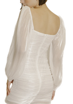  This Wedding Gift Dress has a bow detail, bodycon fit, sheer sleeve and rouched back. Back View  100% Polyester