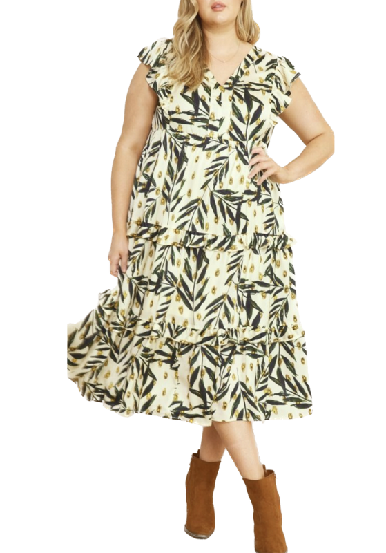 Woodland Palms Dress features a v-neck printed design, ruffle detail and has pockets.  100% Polyester
