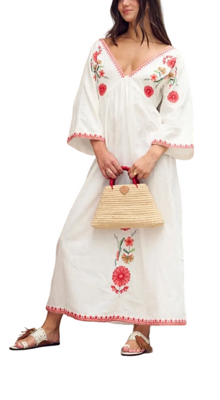 a woman wearinf a Z&L Europe Rosara Maxi Dress