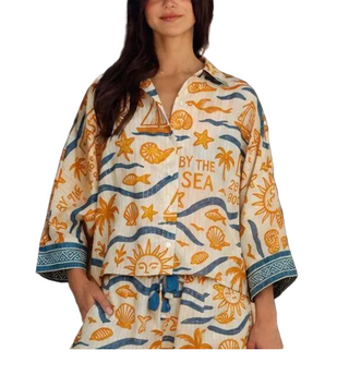 a woman wearing a Z&L Europe Zaya Shirt with nautical motif