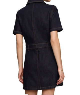 a woman wearing a  Supply Crush Denim Mini Dress