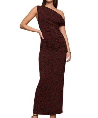 a woman wearing a Z Supply Fremont Dani Floral Maxi Dress.  black with red floral all over floral print.