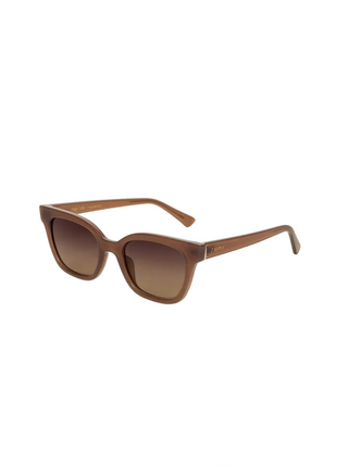 Brown sunglasses on a light gray background
