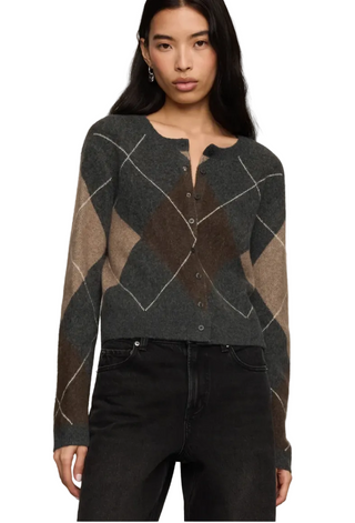 a woman wearing a Z Supply Medina Argyle Cardigan
