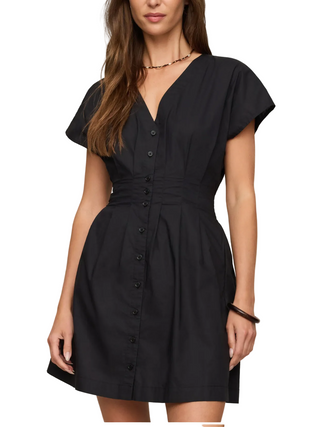 A woman wearing  a black Z Supply Sanna Mini Dress