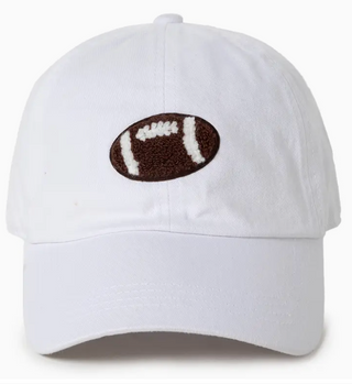 A white baseball cap with a football design on the front.