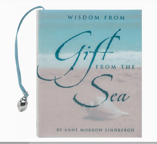 Book titled 'Wisdom from Gift from the Sea' by Anne Morrow Lindbergh with a blue ribbon and charm on a white background.