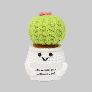 Crocheted cactus with a pot, featuring text and measurements on a white background