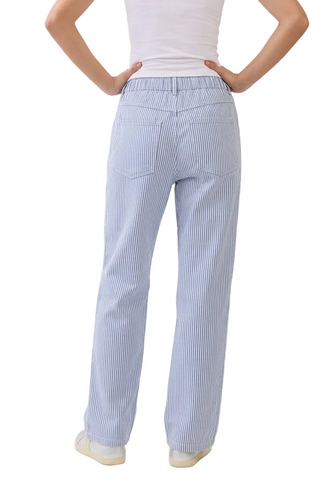 Back view of light blue and white striped pants with elastic back waist and pockets