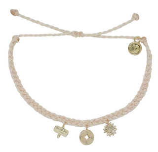 braided ivory bracelet with three charms.  on is a flower, one is a compass, third is a camprv sign