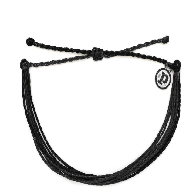 Pura Vida Black Solid Bracelet It’s the bracelet that started it all. Each one is handmade, waterproof and totally unique—in fact, the more you wear it, the cooler it looks. Grab yours today to feel the Pura Vida vibes. - 100% Waterproof- Wax-Coated- Iron-Coated Copper "P" Charm- Adjustable from 2-5 Inches in Diameter