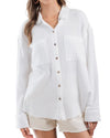Blythe Button Down Gauze Top  Button down shirt with wood-tone buttons and back placket detail.  100% Cotton