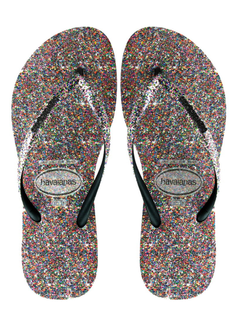 Havaianas Slim Carnaval Sandal - Black Glitter  Get ready to party in the Slim Carnaval! Featuring multi-color glitter straps, you'll be reminiscent of the glitter-clad revelers of Brazil's Carnaval. Plus, Havaianas' signature sole will keep feet cool and comfortable from day to night to day. Thong style Cushioned footbed with textured rice pattern and rubber flip flop sole Made in Brazil Brand: Havaianas Material: 100% high quality, super-soft yet durable rubber Size & Fit: True to size  