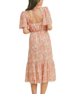 Joselle Floral Midi Dress  -Open Back Midi Dress  -Floral print  -Flutter sleeves  -Round neckline  Material: 100% Polyester back