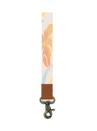 Ke Iki Wrist Lanyard  Small but powerful, this wrist lanyard will keep you organized and moving no matter where life takes you.  3/4" x 4.5"  • Quality hardware  • Genuine Leather (branded logo)