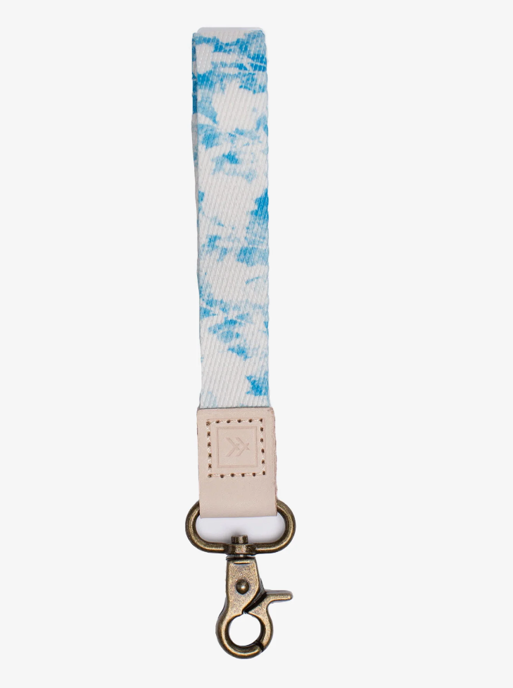 Lexie Wrist Lanyard  Small but powerful, this wrist lanyard will keep you organized and moving no matter where life takes you.  3/4" x 4.5"  • Quality hardware  • Genuine Leather (branded logo)