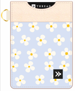 blue with white flowers and yellow dot in middle vertical credit card holder. can attach to key chain