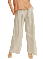 Merrileigh Wide Leg Trousers  High-waisted wide-leg trousers in khaki woven fabric.  55% Rayon 45% Polyester