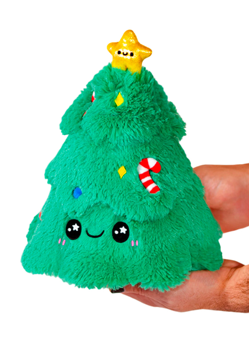 Mini Squishable Christmas Tree  'Tis I! The Mini Squishable Christmas Tree! I'm what people decorate, fawn over, stick stuff under, and rock around for a month straight. And while my more...alive compatriots might be more fragrant and flammable. I happen to be immortal! Beat that, real trees! So you can snuggle me all year round. There's no rule against it. I asked.