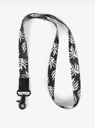 Palms Neck Lanyard  Take on the world in style with our Neck Lanyard–the perfect sidekick to carry your keys, Thread® essentials, and more. Keep track of your stuff and express yourself with our convenient and cool lanyards.  • Polyester strap, genuine leather loop and metal clasp   • Quality Metal clasp