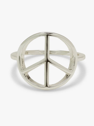 Pura Vida Peace Ring   Add joy and good vibes to any outfit with our Peace Sign Ring. This simple silver piece features a delicate band, with a cutout peace sign design that spreads love (and ‘70s style).