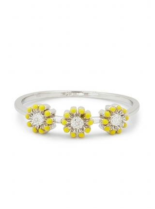 Get ready for spring with the new Perfect Posies Ring from Pura Vida. It features three yellow enamel posies on a silver toned band. 