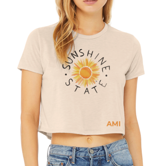 Tan croppedtop that has painting of sun and says sunshine state