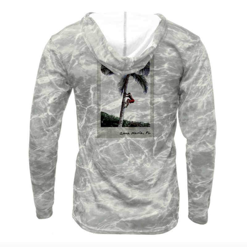 dry fit shirt with upf in a water grey pattern with photo of boy climbing palm tree on the back