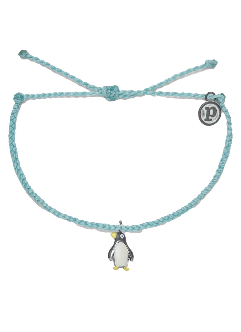 Wildlife Conservation Penguin Bracelet  Show your support to organizations that are making a difference! Every purchase of this bracelet is dedicated to helping the Wildlife Conservation Network in protecting communities, wildlife, and our natural resources.  Brand: Pura Vida Material: 100% Waterproof, Wax-Coated, Iron-Coated Copper "P" Charm Size & Fit: Adjustable from 2-5 Inches in Diameter